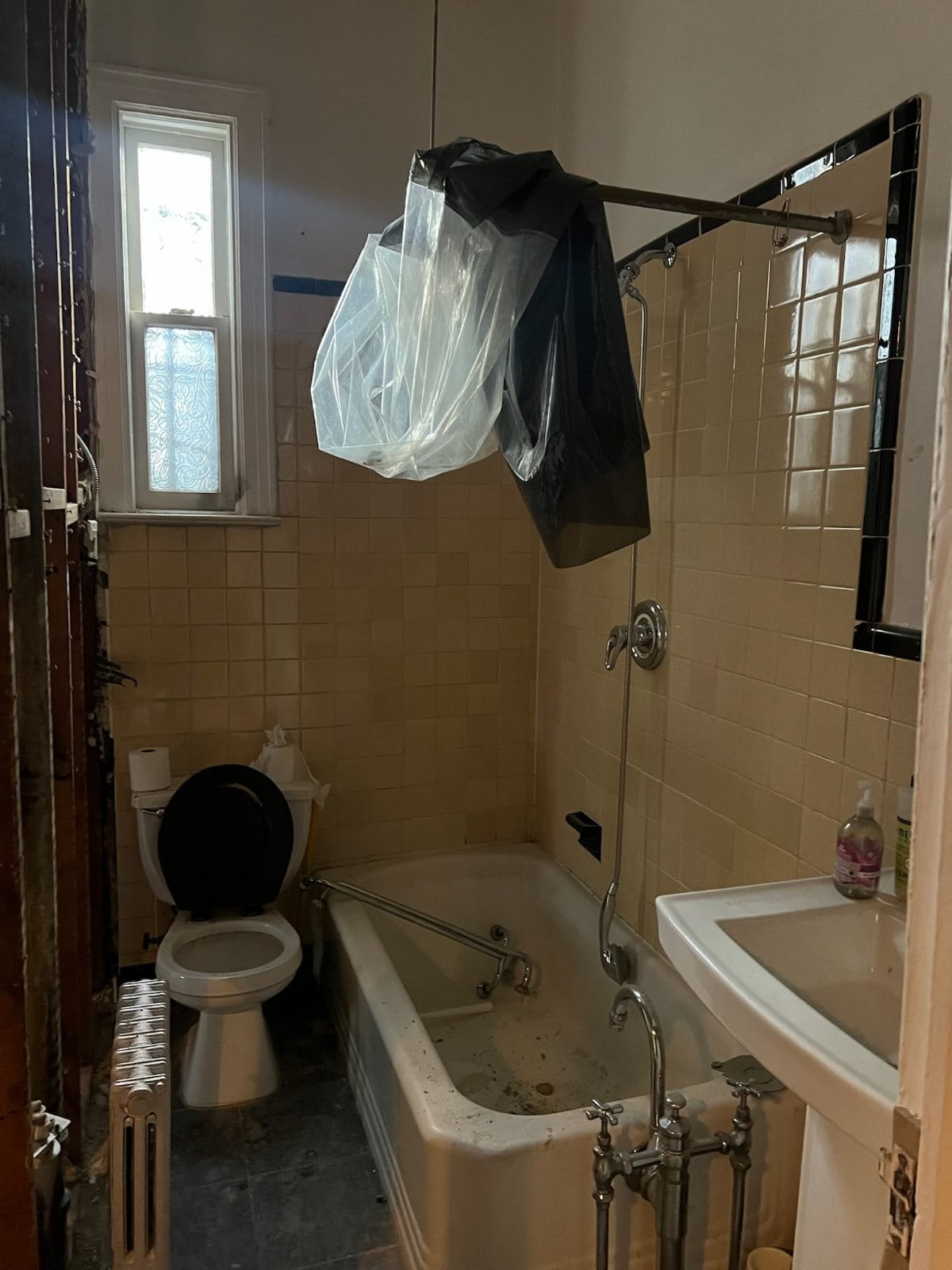 Kid ‘s bathroom conditions before a complete gut renovation and remodel.