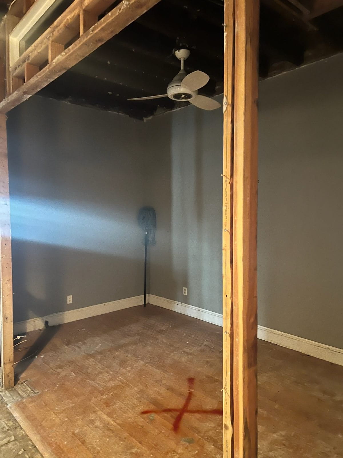 Dining room in dated condition prior to a full gut renovation and conversion into a primary bathroom.